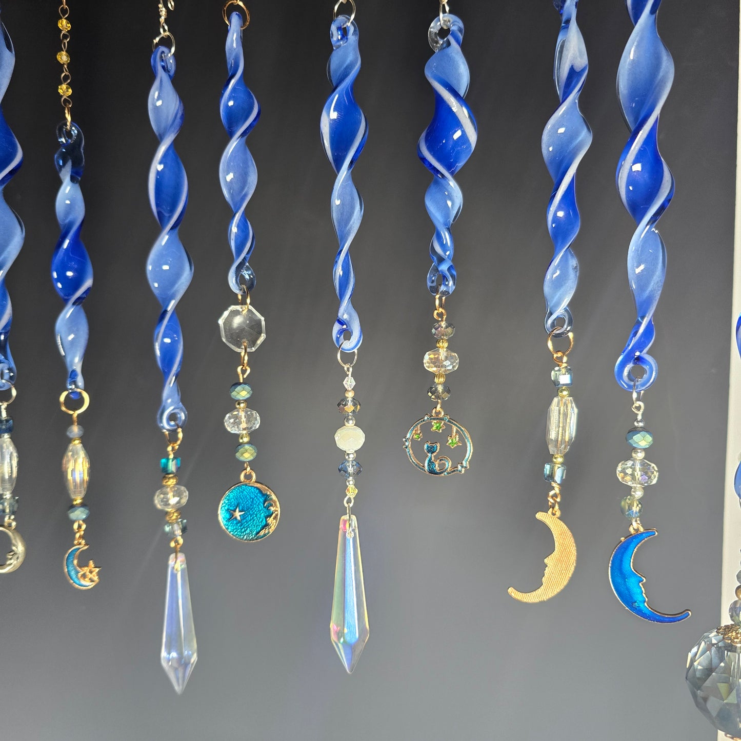 Glow in the dark moon suncatchers
