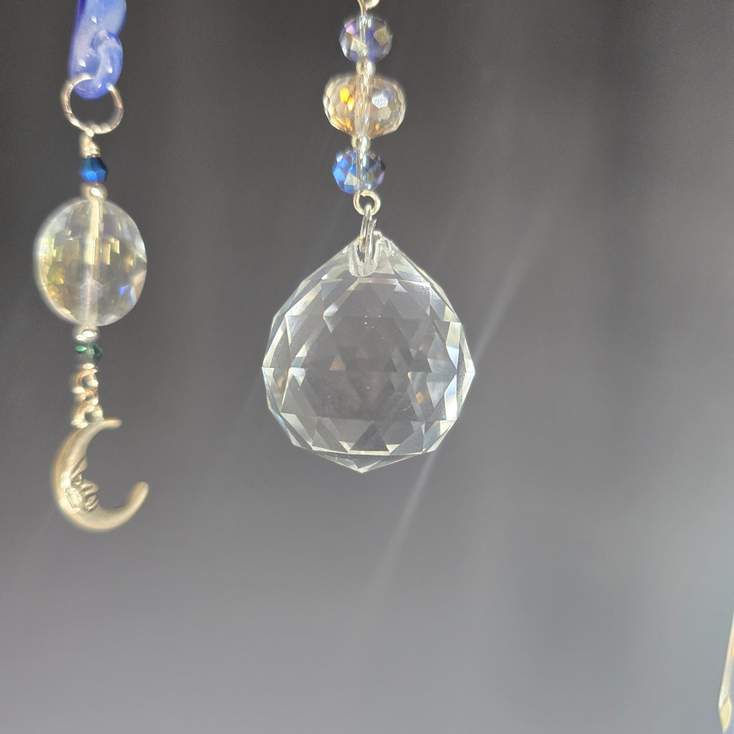 Glow in the dark moon suncatchers