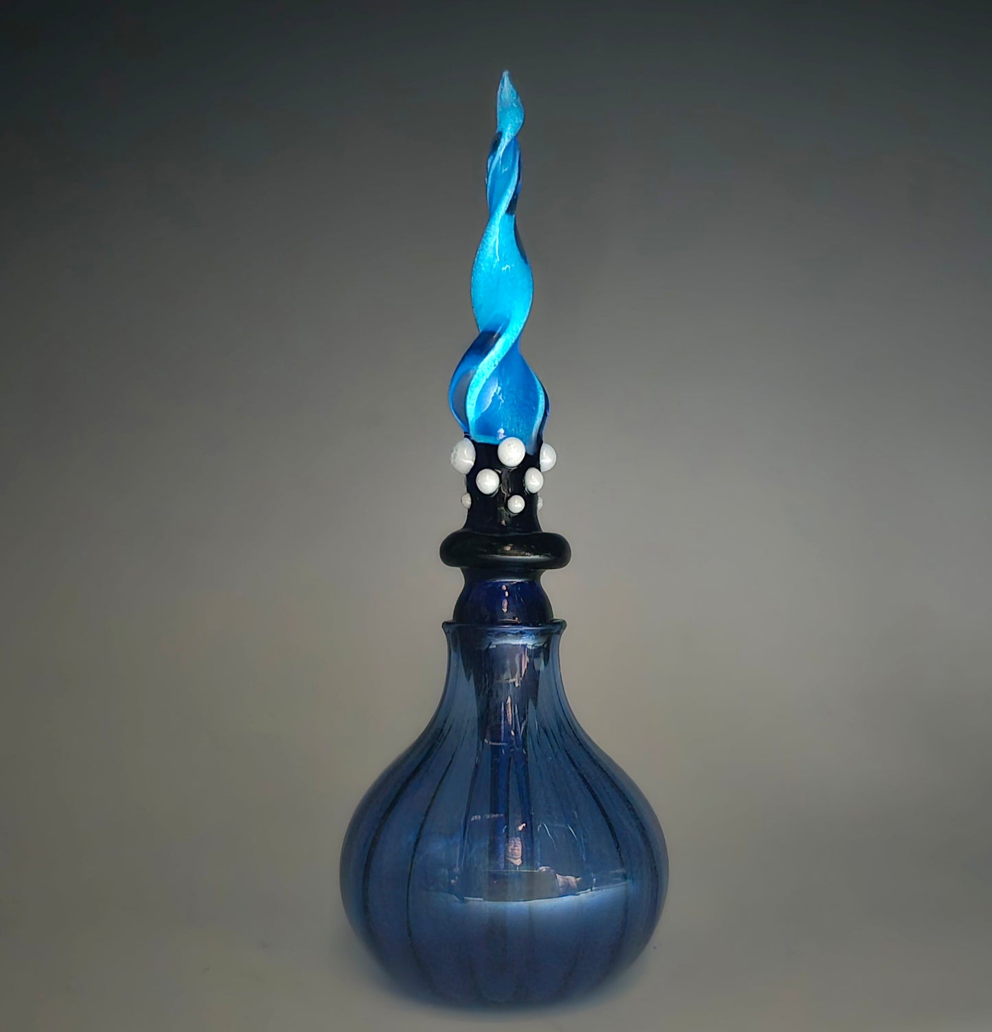 Blue Glowing Perfume Bottle