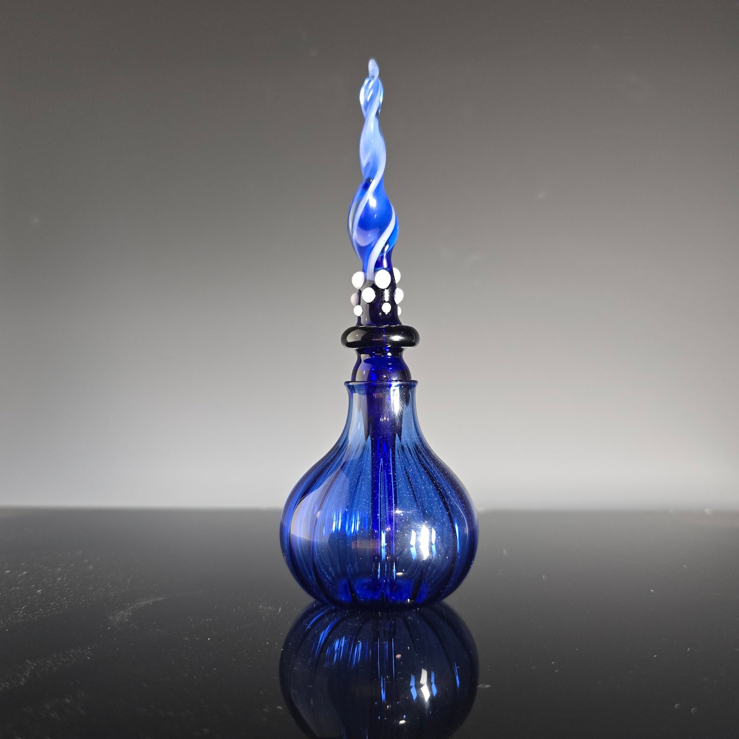 Blue Glowing Perfume Bottle