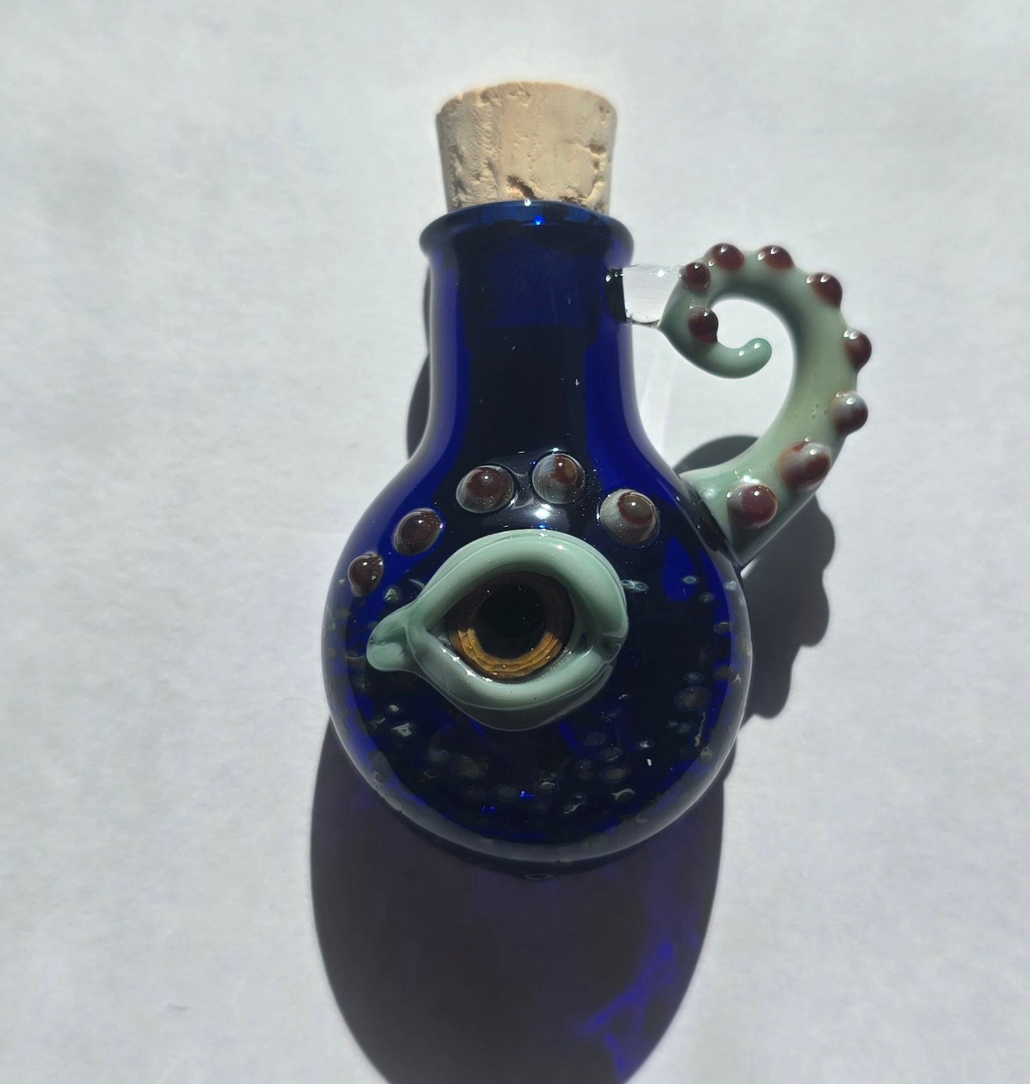 Eyeball Monster Potion Bottle Necklace, Cobalt and green with tentacle arm