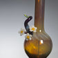 Perfume Bottle with decorative Daisy elements on a gray background