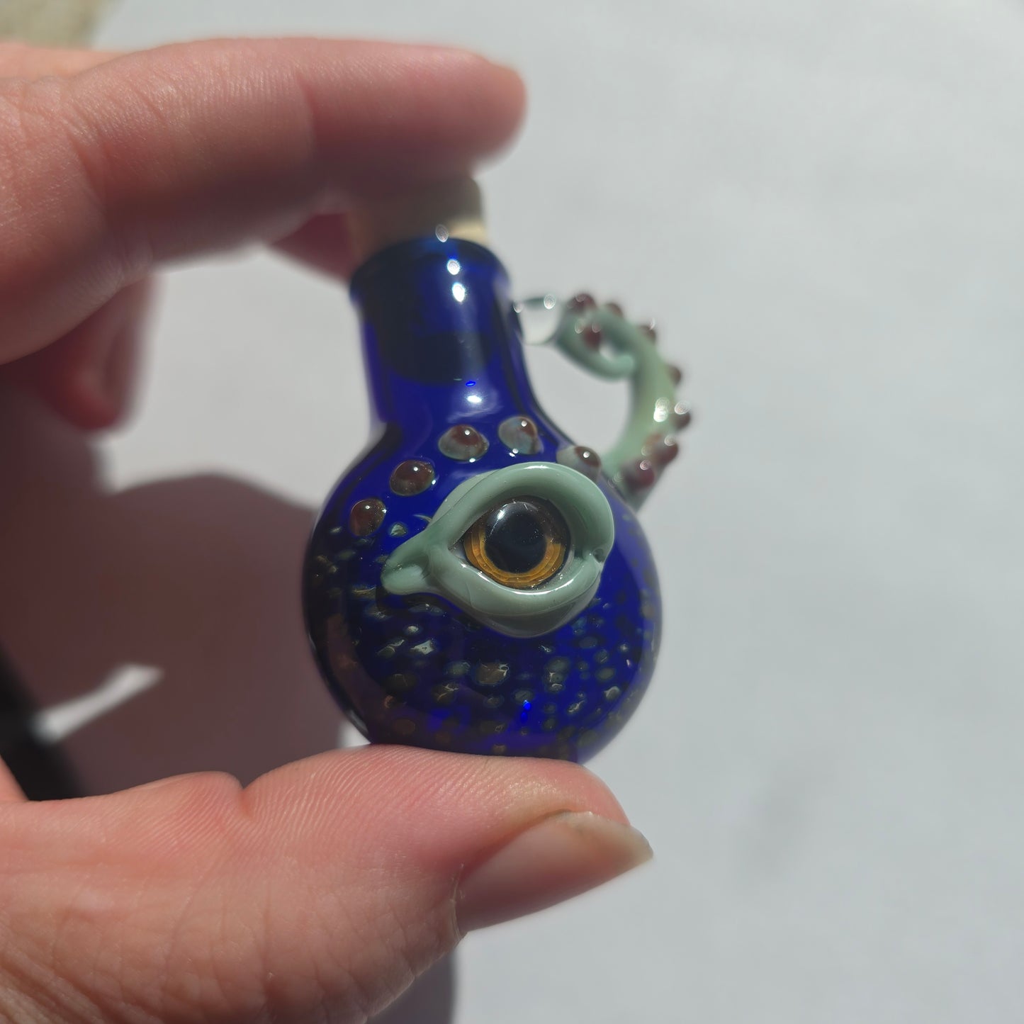 Eyeball Monster Potion Bottle Necklace, Cobalt and green with tentacle arm