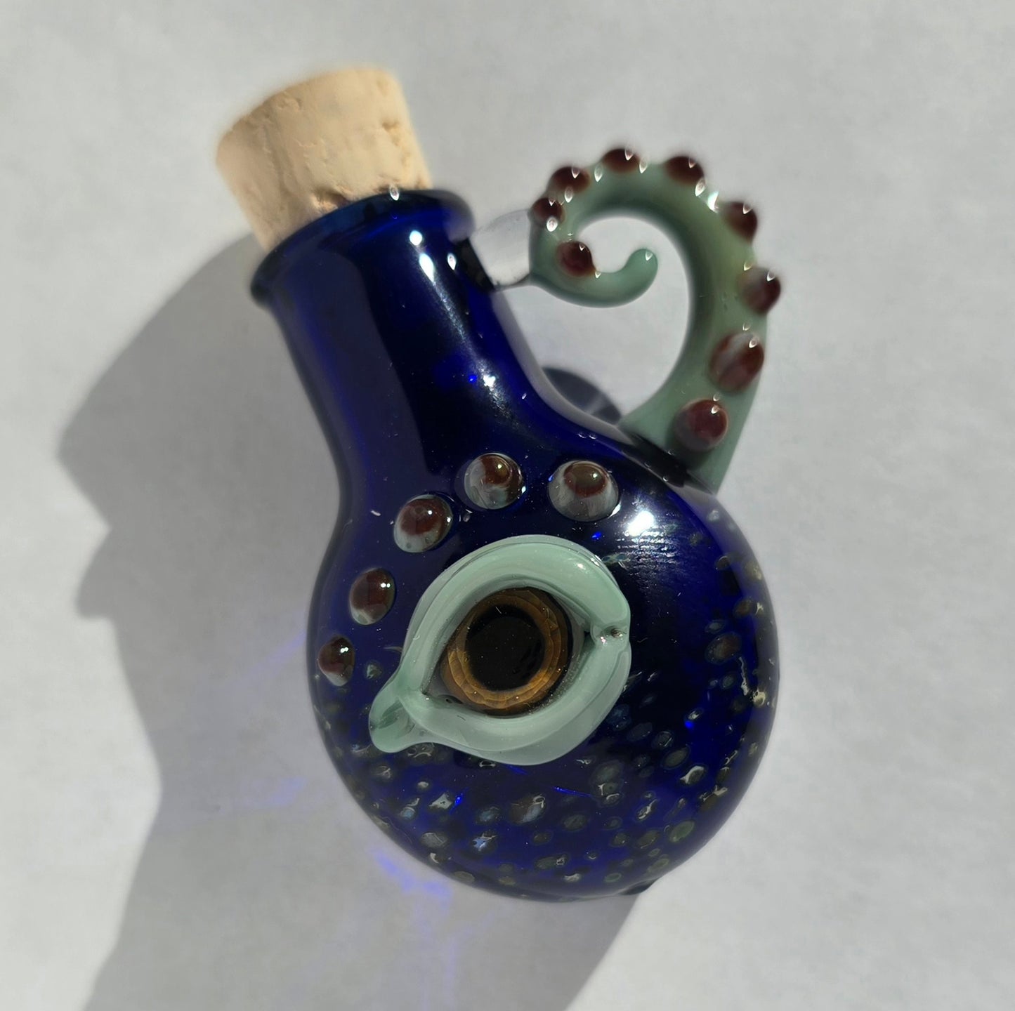 Eyeball Monster Potion Bottle Necklace, Cobalt and green with tentacle arm
