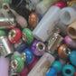 Assorted dread bead packs.  50g and 100g