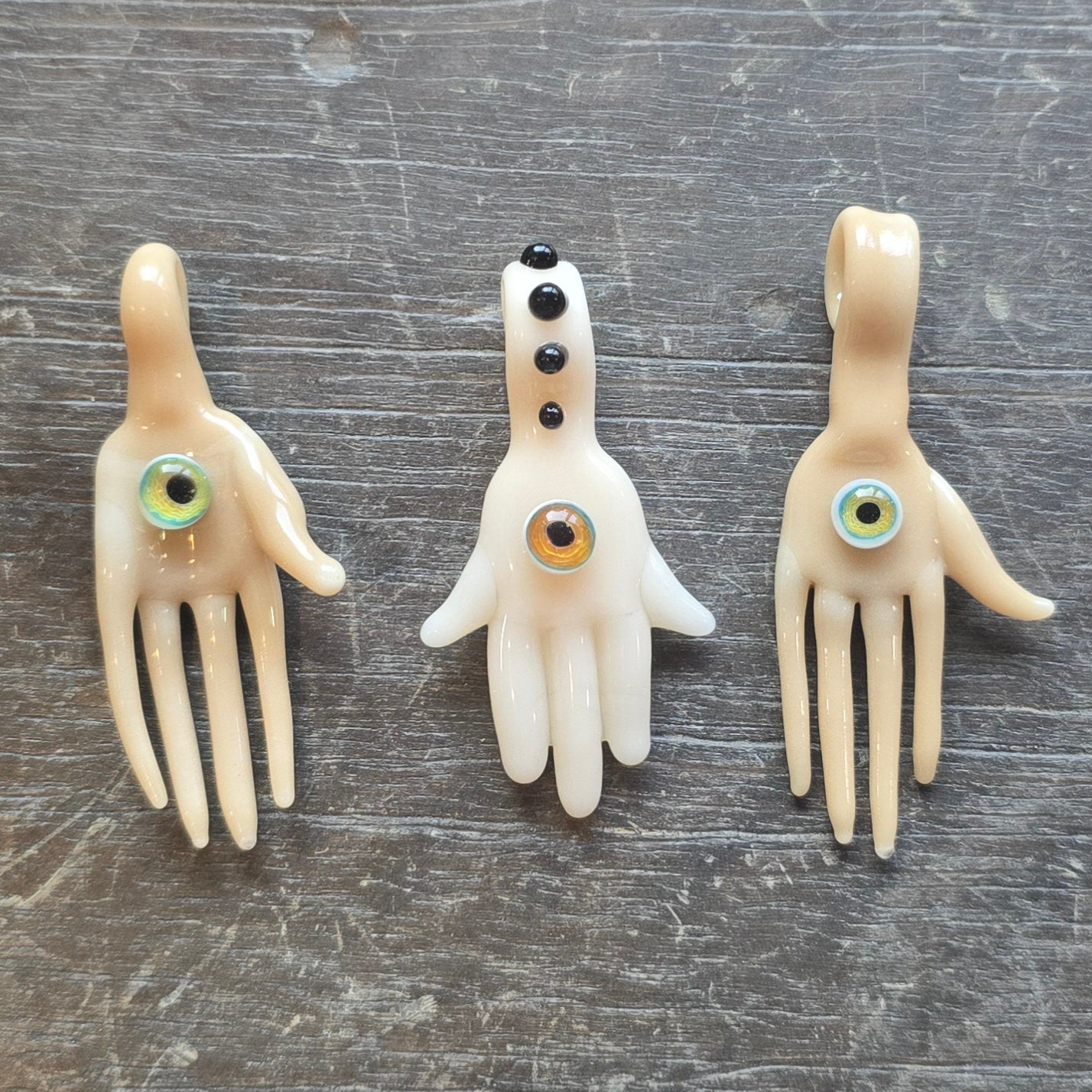 Hand and Eyeball Pendants