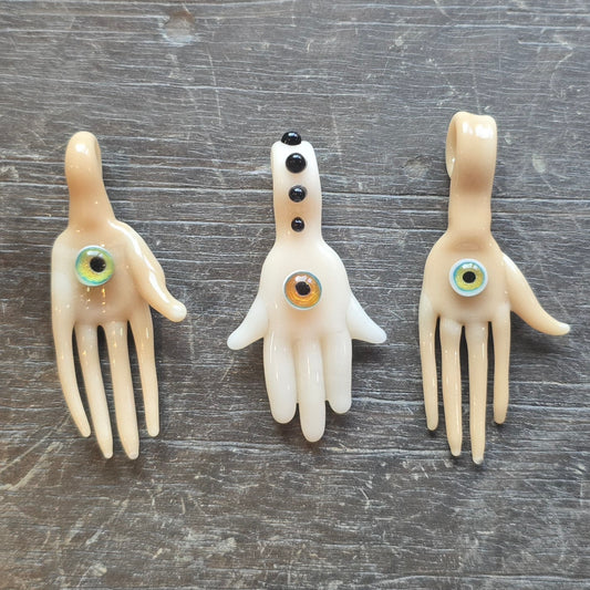 Hand and Eyeball Pendants