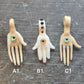 Hand and Eyeball Pendants